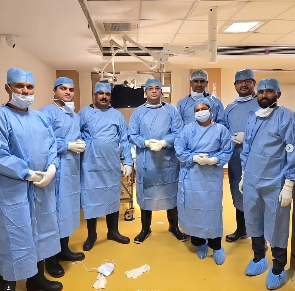 Dr. Manish Kumar Saini with the surgical team in the operating theatre